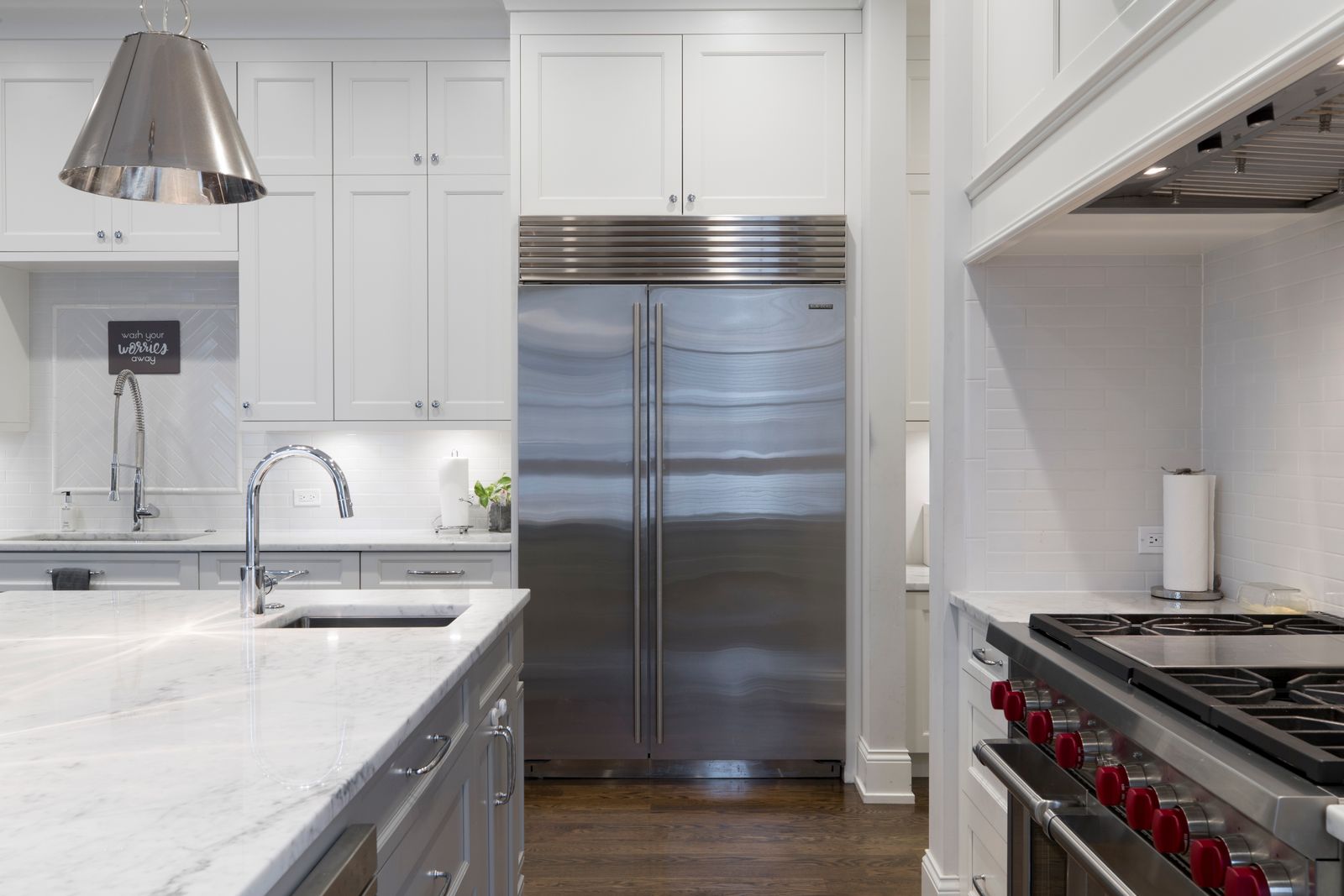 Liebherr Monolith built-in column refrigerator in a luxury white kitchen — professional Monolith repair